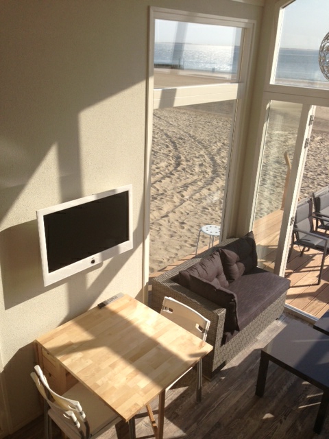 Zeezicht strandhuisje Westduin
